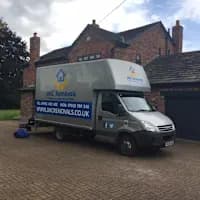 JMC Removals team loading the van — professional removal crew in Warrington